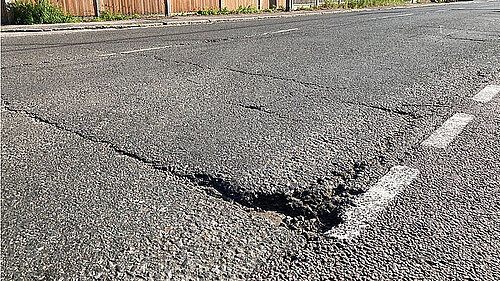 Picture of a pothole in a road