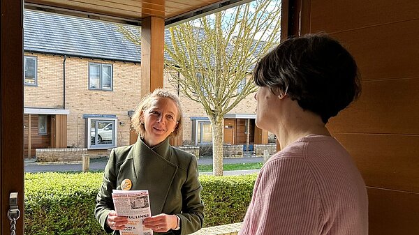 Cllr Nadya Lokhmotova talking to someone